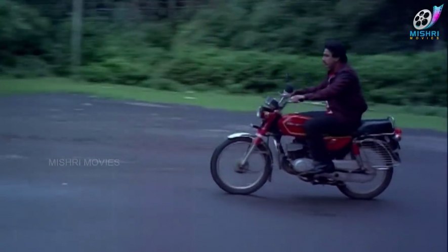 Ind-Suzuki AX 100